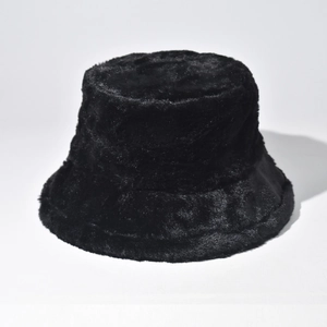 Detailed texture of black faux fur plush bucket hat with soft winter warm material