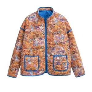 Quilted cotton jacket with vintage orange floral print and blue trim detail