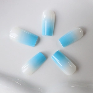 Blue and white ombre long square press-on nails with a glossy finish on white background