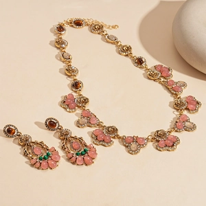 Vintage gold-tone jewelry set with tiger eye stones and floral diamond necklace and earrings