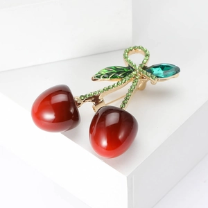 Chic cherry brooch with red enamel fruits and green crystal inlaid golden leaves