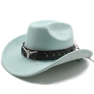 Detail of mint green western cowgirl hat featuring silver bull head logo and leather band