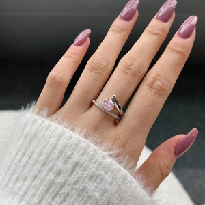 S925 sterling silver ring featuring a pink oval gemstone worn on a finger