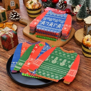 Ugly Christmas sweater pattern paper napkins in red blue and green festive table decor