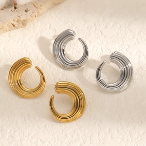 Minimalist C-shaped stainless steel earrings in gold and silver with twisted textures