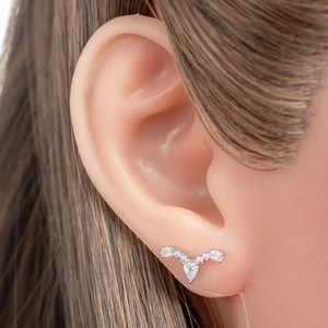 Silver titanium steel ear bone stud featuring a V-shape design and a heart-shaped zircon