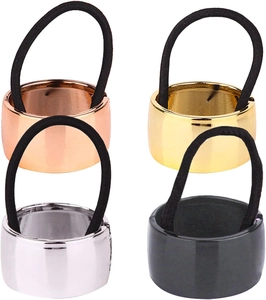 Detail of four metal ponytail cuff hair rings in rose gold, gold, silver and black