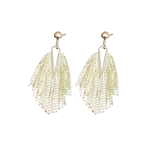 Minimalist gold round tassel earrings with a sleek metallic finish on white background