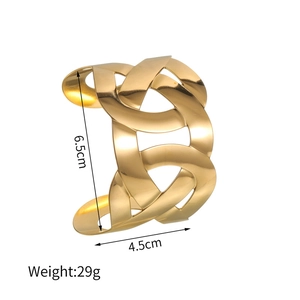Detailed view of 18K gold plated hollow twist bangle with dimensions 6.5cm and 29g weight