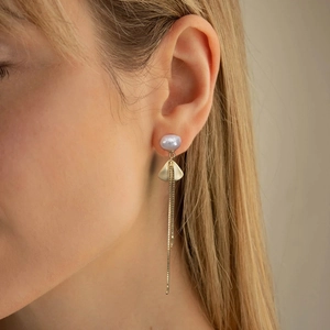 Detailed view of elegant S925 sterling silver long tassel earrings with freshwater pearls