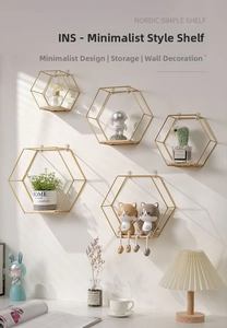 Detail of Nordic hexagonal wall shelves with gold iron frames and wooden trays