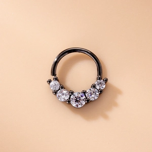 Detail view of black plated nose ring featuring five sparkling round cubic zirconia stones