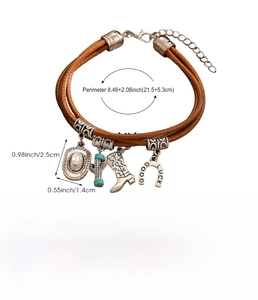 Detailed view of bohemian leather bracelet with western charms and size measurements