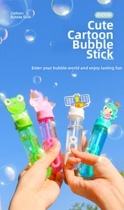 Close-up of four colorful cartoon bubble wands featuring animal and space designs