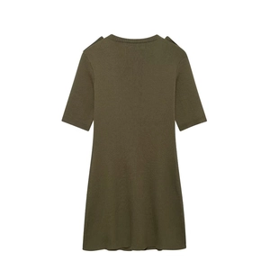 Detail view of the back of a dark olive green short-sleeved knitted dress with fine texture