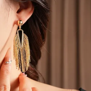 Elegant gold-plated bead tassel drop earrings with geometric studs for a modern look