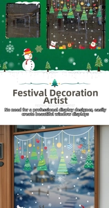 Detail of Christmas window clings featuring Santa, reindeer, and festive snowflake patterns
