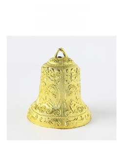Detailed view of golden Christmas bell with embossed star patterns and metallic finish
