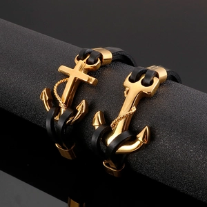 Men's nautical braided leather bracelet featuring a polished gold stainless steel anchor