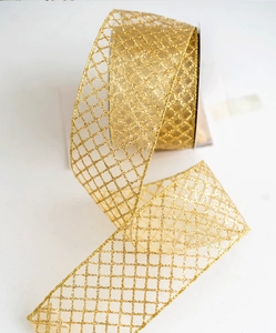 Close-up of golden glitter mesh ribbon with diamond grid pattern for Christmas decor