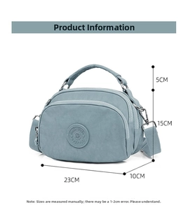 Light blue nylon crossbody bag details with three zip compartments and size measurements