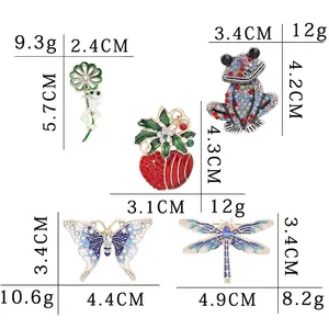 Size chart showing dimensions for frog, apple, butterfly, and dragonfly crystal brooches