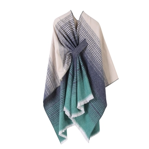 Ethnic knit shawl with blue green gradient stripes and tassel fringe on white background