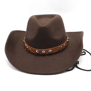 Detail view of the brown wool felt cowboy hat with vintage studded leather belt