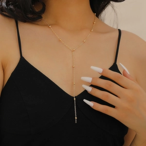 Elegant 18K gold-plated double-layer necklace with chic beads on a minimalist chain