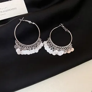 Silver tiered sequin fringe hoop earrings for women with a minimalist bohemian aesthetic