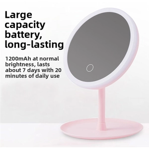 Detail of pink LED makeup mirror showing 1200mAh battery capacity and 7-day battery life