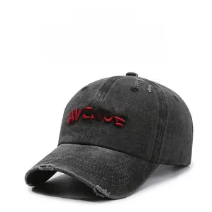 Detail of distressed vintage baseball cap with red Avenue 3D embroidery and washed fabric