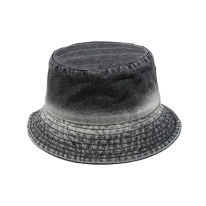 Close-up of vintage gradient wash denim bucket hat with parallel reinforced brim stitching