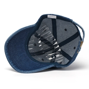 Navy denim baseball cap with NYC embroidery and adjustable metal buckle closure