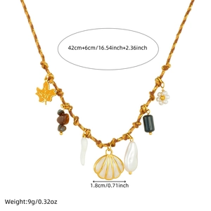 Detail showing woven necklace length and shell pendant dimensions with multi-element charms