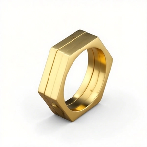 Industrial golden hexagon nut ring with brushed metal finish in 45-degree view