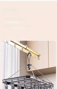 Detail of multi-clip aluminum clothes drying rack with durable gold electroplated coating