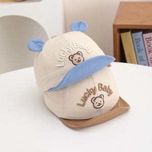 Breathable baby sun hat with cute ears and Lucky Baby embroidery in blue and brown colors