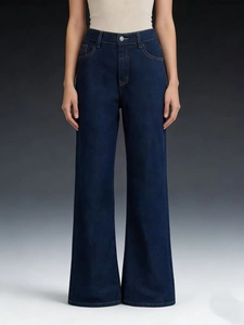 Detailed front view of high-waist wide-leg denim jeans with metal button and deep blue texture