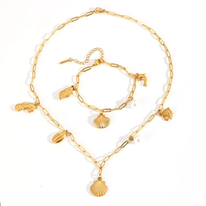 Golden ocean theme jewelry set with shell pendants and pearls on paperclip chains