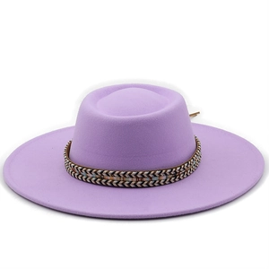 Detail view of lavender wool felt flat top hat with ethnic patterned woven band