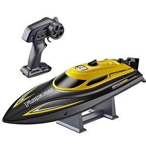 Black and yellow HJ812 high-speed remote control boat with 2.4G transmitter on display stand