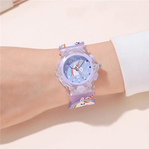 Kids purple unicorn watch with glowing LED light and soft silicone strap worn on wrist