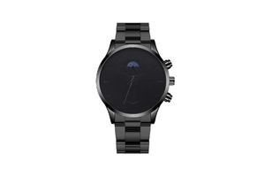 Detail of black quartz watch face featuring moon phase display and metal link strap