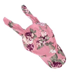Pink floral baby sun hat with decorative rabbit ears and brim on a white background