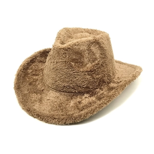 Detail of soft brown faux fur texture on a wide-brim western cowboy hat felt finish