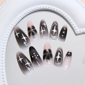 Gothic black and pink gradient press-on nails with silver star and cross metallic details