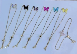Adjustable gold butterfly charm bracelets featuring colorful rhinestones for women