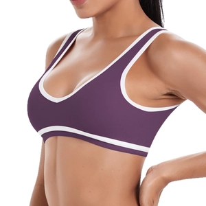Breathable two-tone purple sports bra with white trim for yoga and fitness training