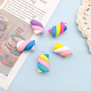 Detailed view of colorful spiral resin marshmallow charms with silver metal rings for DIY